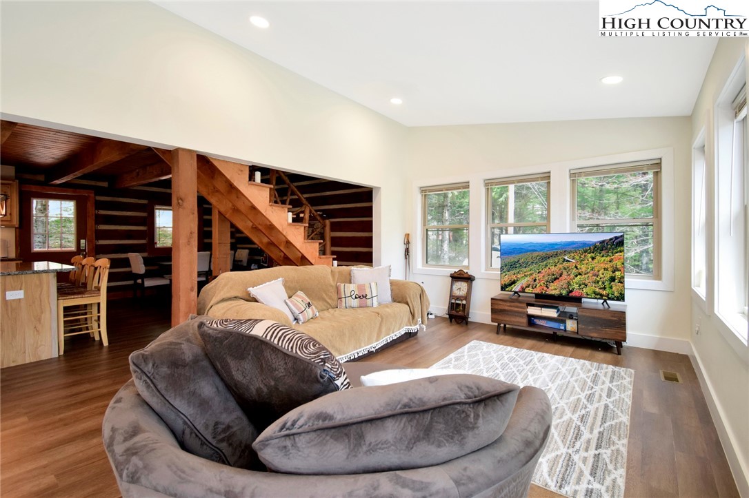 269 Willow Mountain Drive Vilas, NC 28692 - Photo 7 of 37 a living room with furniture and a flat screen tv