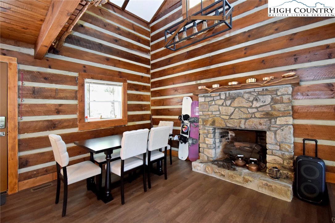 269 Willow Mountain Drive Vilas, NC 28692 - Photo 9 of 37 a view of a livingroom with furniture and a fireplace