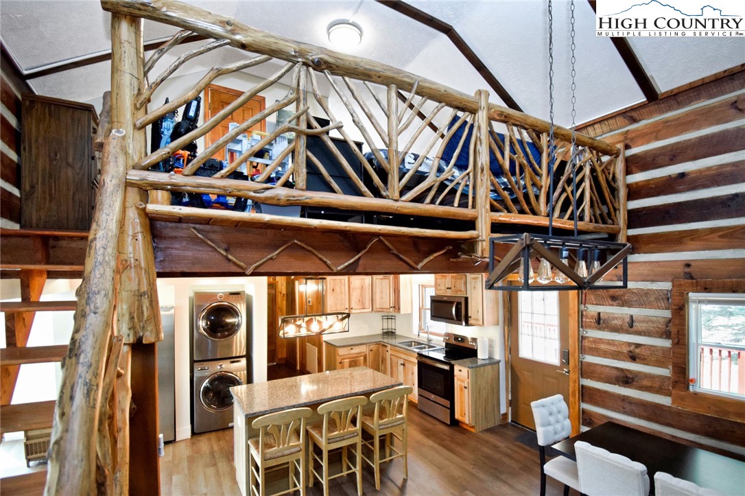 269 Willow Mountain Drive Vilas, NC 28692 - Photo 10 of 37 a view of an chairs and table in the patio