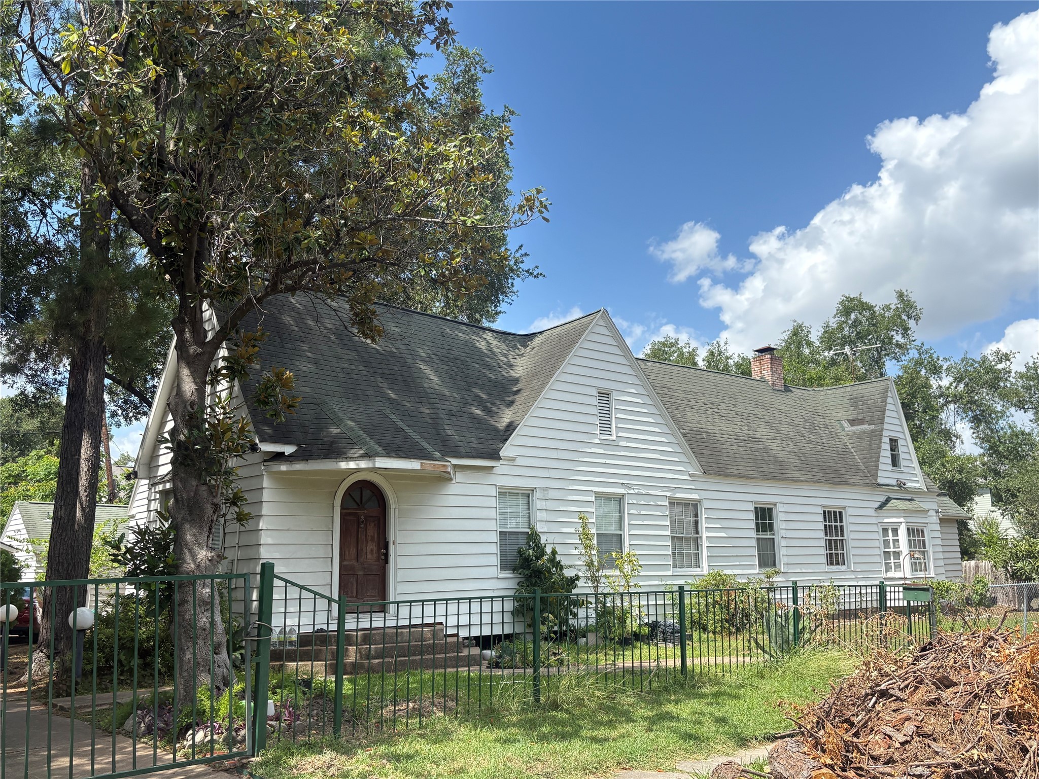 2302 Wordsworth Street Houston, TX 77030 - Photo 3 of 6 a front view of a house with garden
