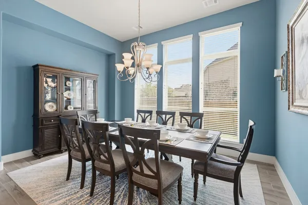a kitchen with stainless steel appliances a refrigerator sink and stove