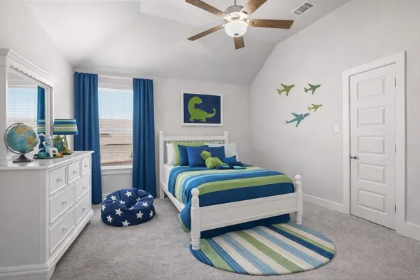 an aerial view of a house with garden space and lake view