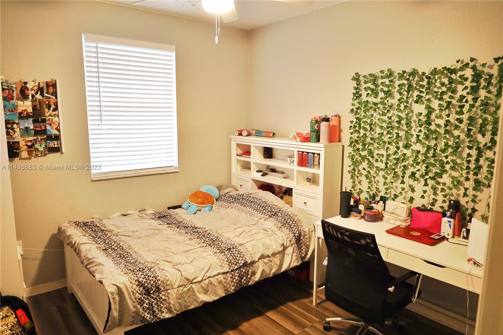 301 Southwest 87th Path Miami, FL 33174 - Photo 17 of 22 a bedroom with a bed and a window