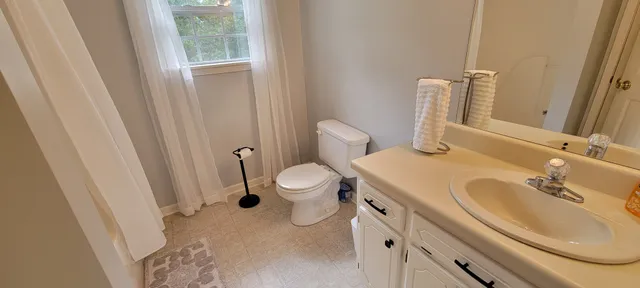 a bathroom with a sink and a toilet