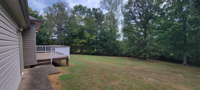 a view of outdoor space and yard