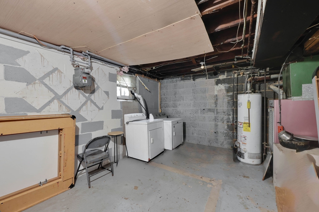 7 Kelly Place Springfield, MA 01104 - Photo 36 of 38 a view of storage and utility room with a garage