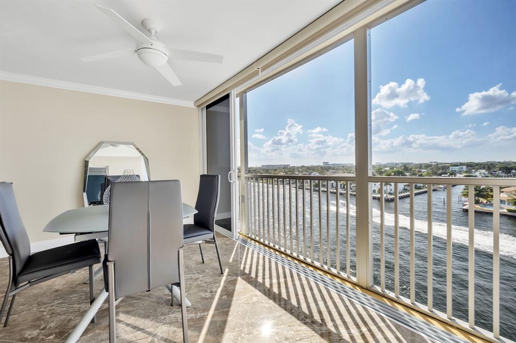 615 North Riverside Drive, Unit 702 Pompano Beach, FL 33062 - Photo 19 of 38 a view of a living room and a balcony