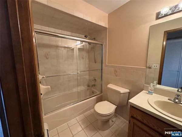 a view of an empty room with windows