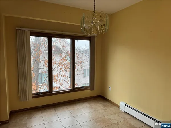 a kitchen with a sink and a refrigerator