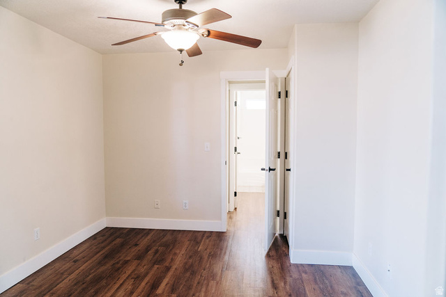 1825 West Mathis Park Place, Unit 40 St. George, UT 84770 - Photo 12 of 28 Spare room with dark wood finished floors and a ceiling fan