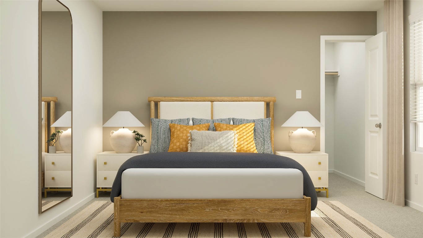 431 Silvercloud Drive Lockhart, TX 78644 - Photo 15 of 39 a bedroom with a bed and a mirror