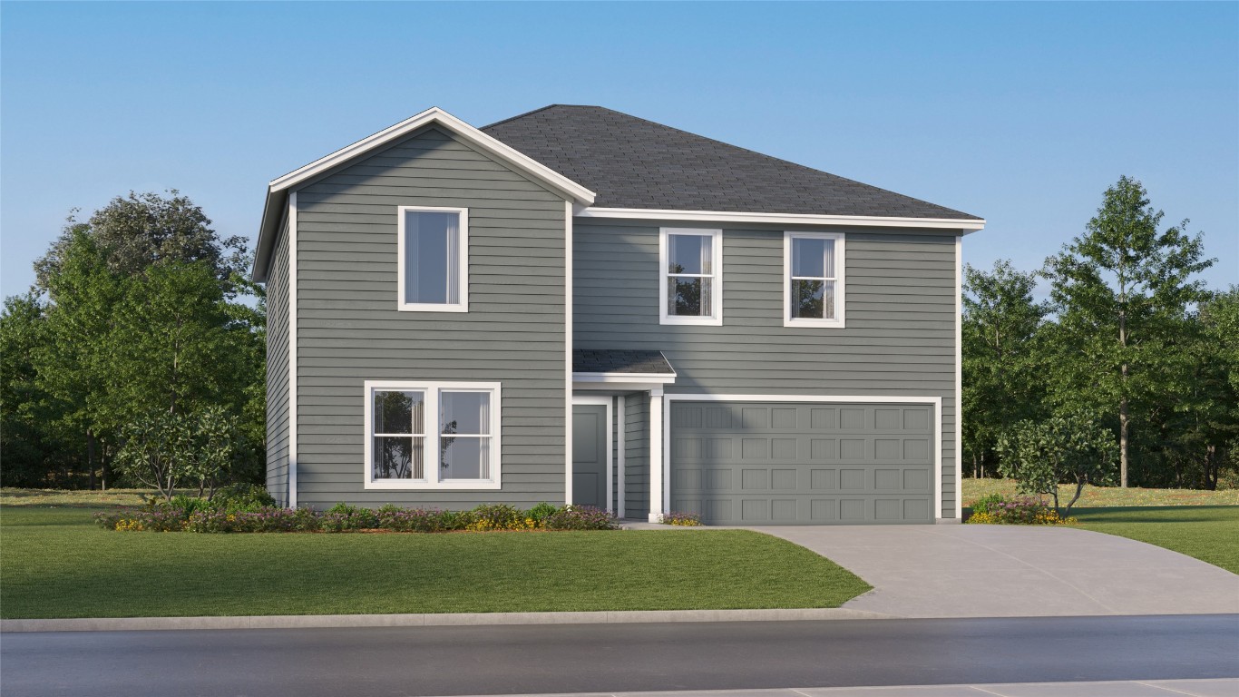 431 Silvercloud Drive Lockhart, TX 78644 - Photo 2 of 39 a front view of a house with a garden