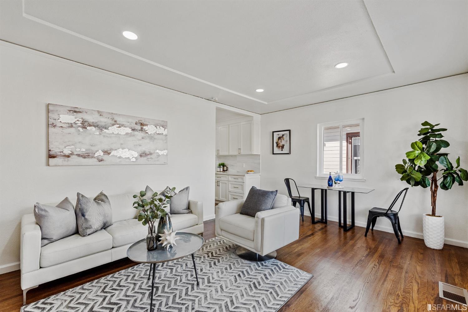 5955 Hayes Street Oakland, CA 94621 - Photo 4 of 20 a living room with furniture and wooden floor