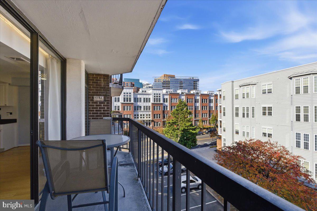 1401 North Rhodes Street, Unit 503 Arlington, VA 22209 - Photo 15 of 17 a city view from a balcony