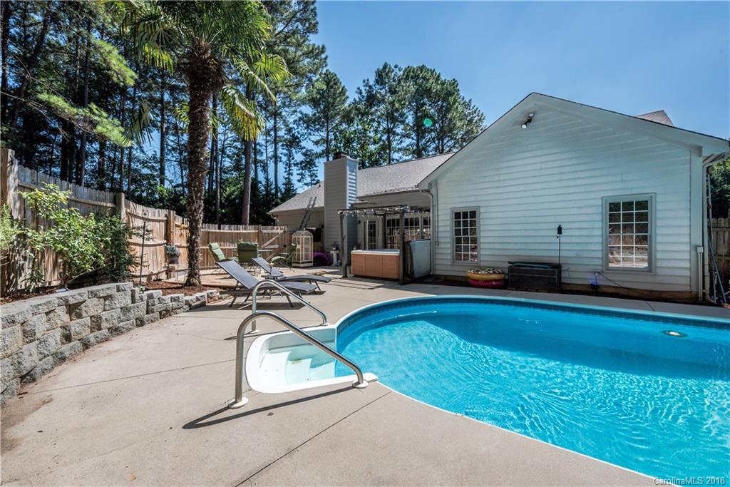 701 Monticello Drive Fort Mill, SC 29708 - Photo 21 of 21 a view of a house with swimming pool and sitting area
