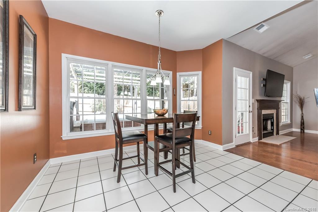 701 Monticello Drive Fort Mill, SC 29708 - Photo 9 of 21 a dining room with furniture and window
