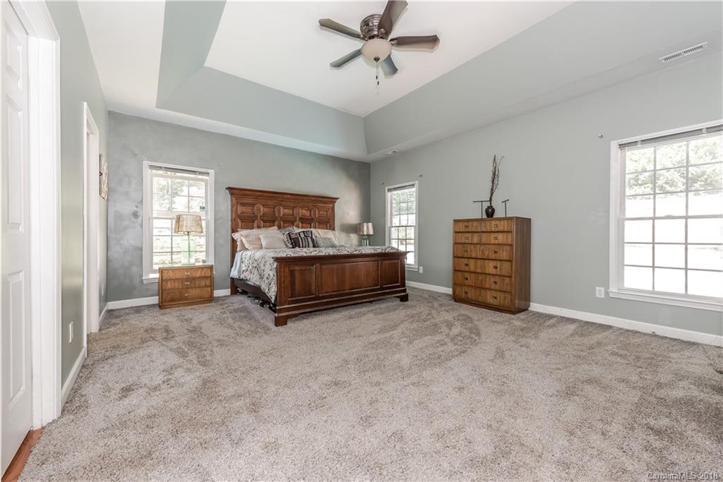 701 Monticello Drive Fort Mill, SC 29708 - Photo 10 of 21 a spacious bedroom with a bed and a window