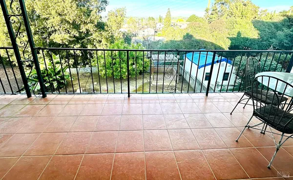 a view of yard with patio