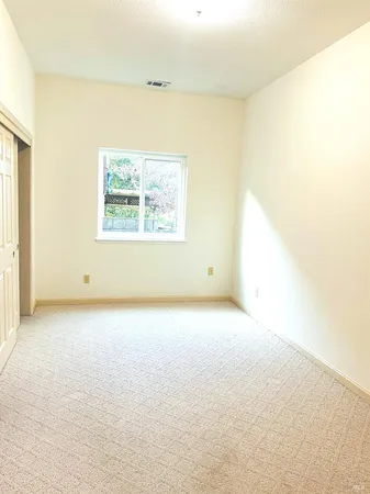 a view of a porch with a furniture