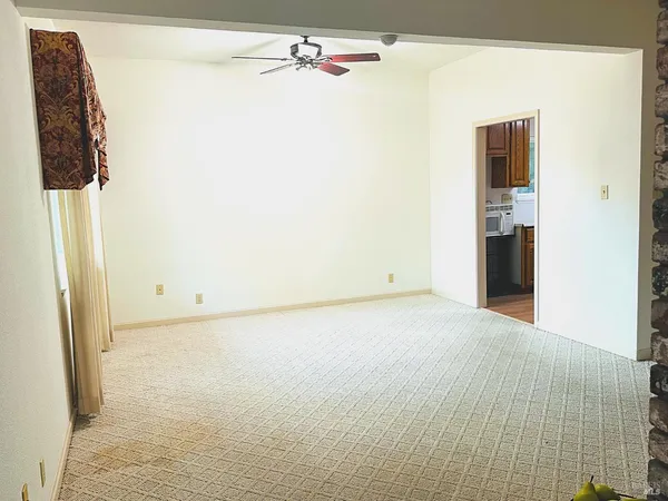 a spacious bathroom with a double vanity sink and a mirror