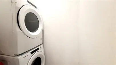 a close up view of a washer and dryer