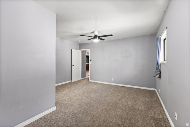2576 Gramercy Avenue Ogden, UT 84401 - Photo 16 of 20 Unfurnished room featuring ceiling fan and carpet flooring
