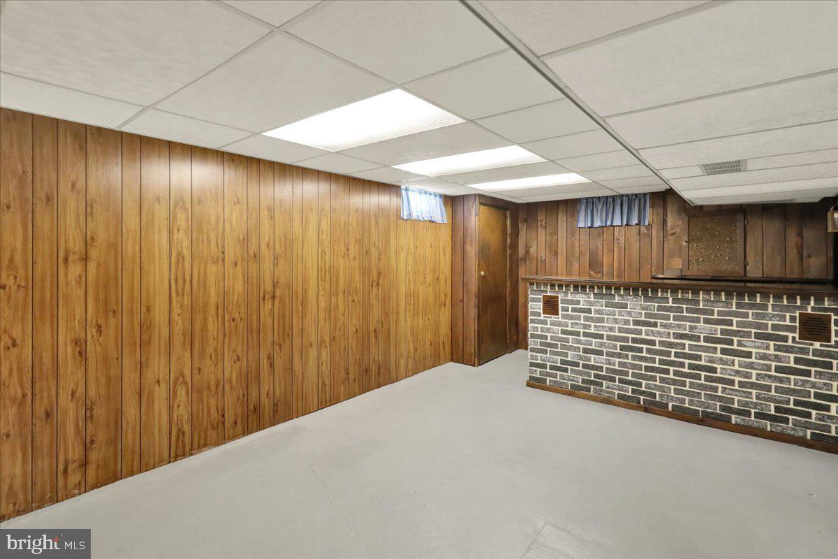 702 Frederick Street Reading, PA 19607 - Photo 33 of 47 Spacious basement with rustic charm.