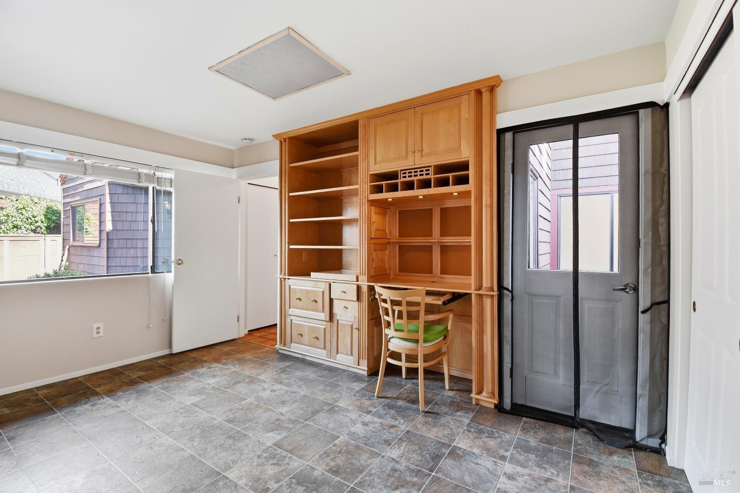 1320 North Street, Unit 7 Santa Rosa, CA 95404 - Photo 21 of 28 an empty room with windows and closet