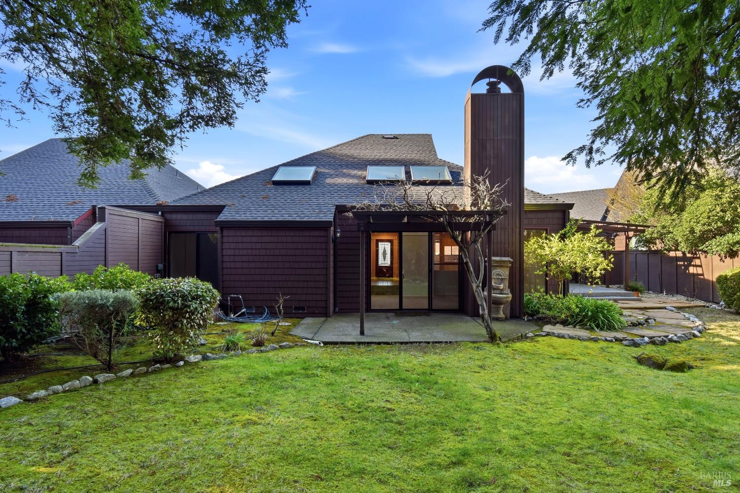 1320 North Street, Unit 7 Santa Rosa, CA 95404 - Photo 25 of 28 a front view of a house with garden