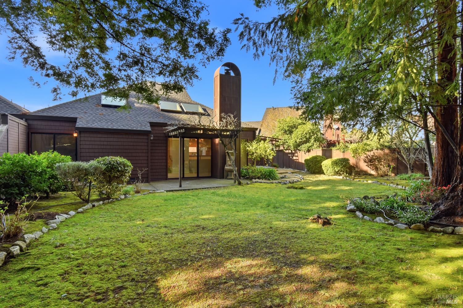 1320 North Street, Unit 7 Santa Rosa, CA 95404 - Photo 3 of 28 a front view of a house with garden