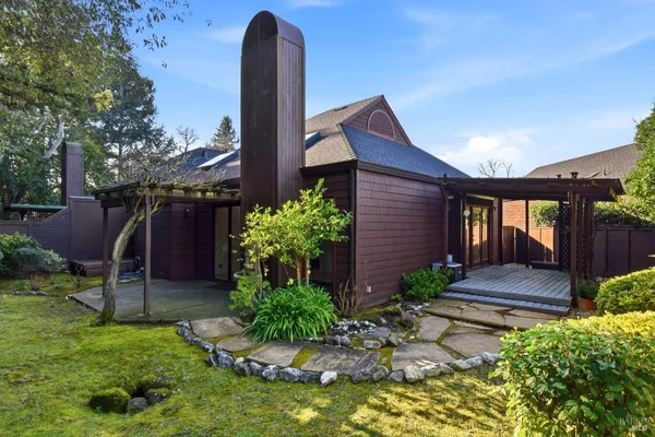 a backyard of a house with lots of green space