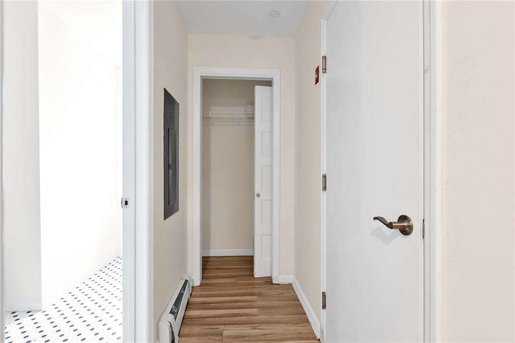15 Stanton Road Brooklyn, NY 11235 - Photo 22 of 29 a view of a hallway with wooden floor and entryway