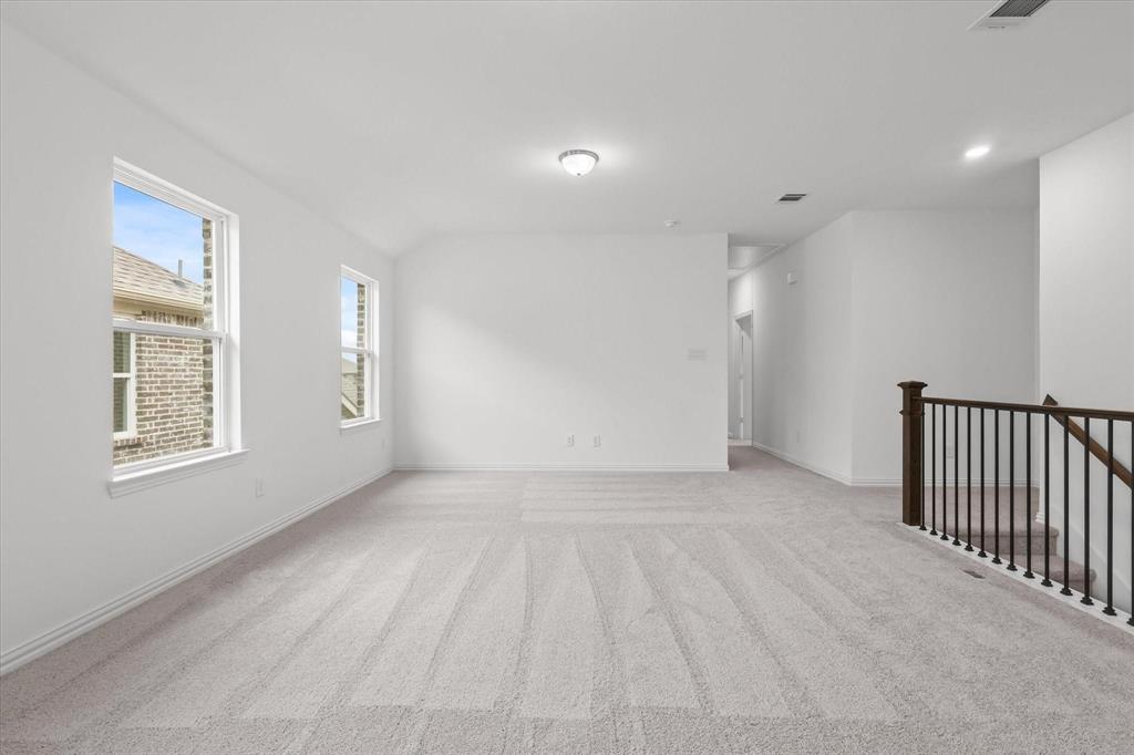 1663 Gracehill Way Forney, TX 75126 - Photo 18 of 30 a view of an empty room with a window