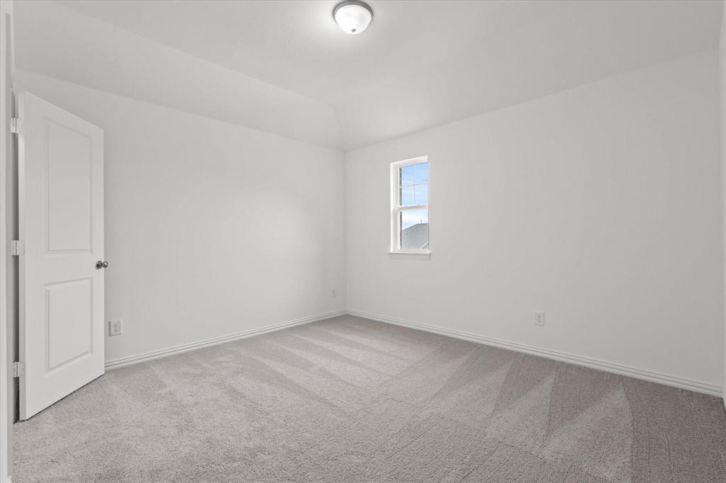 1663 Gracehill Way Forney, TX 75126 - Photo 20 of 30 a view of an empty room with a window