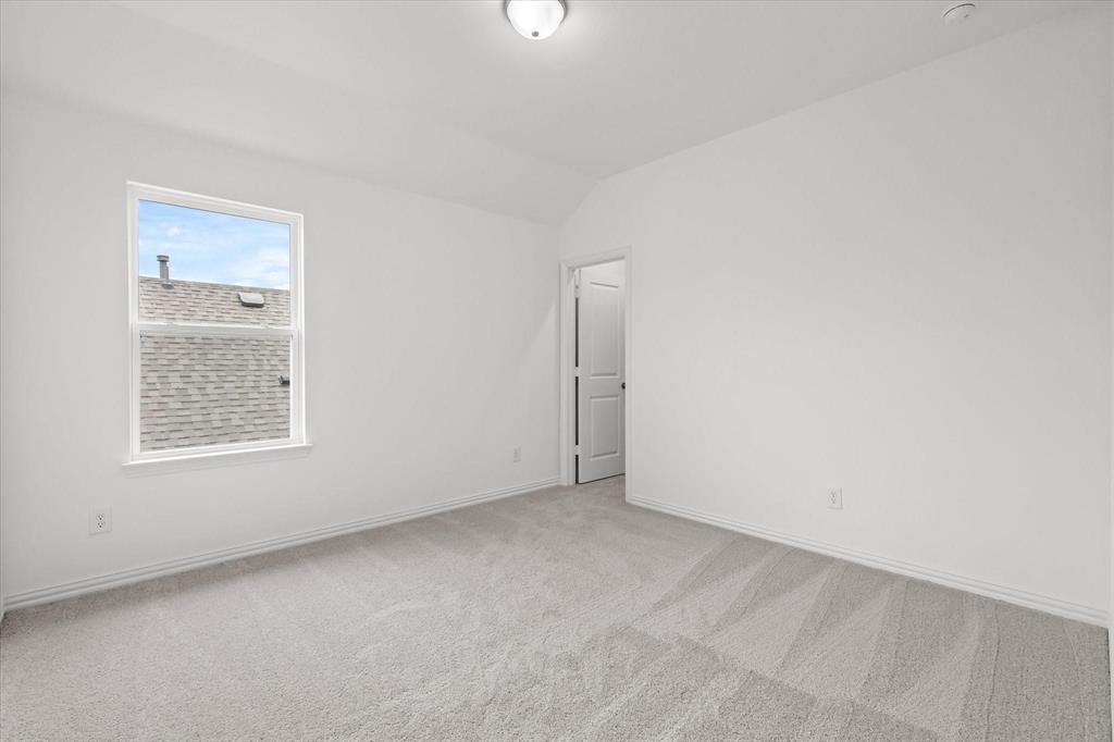 1663 Gracehill Way Forney, TX 75126 - Photo 25 of 30 an empty room with a window