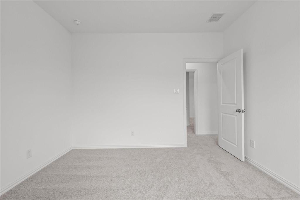 1663 Gracehill Way Forney, TX 75126 - Photo 26 of 30 a view of an empty room