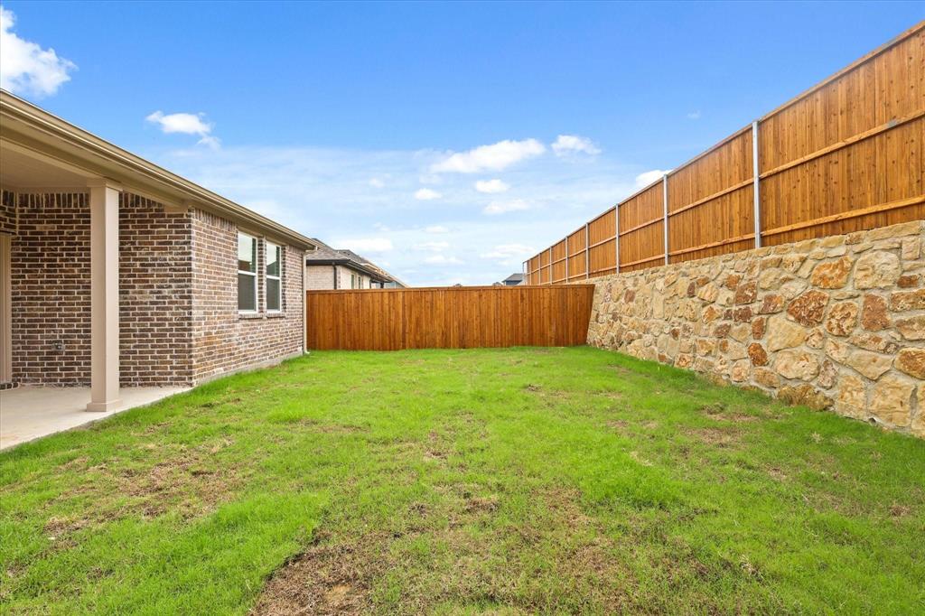 1663 Gracehill Way Forney, TX 75126 - Photo 30 of 30 a view of a backyard