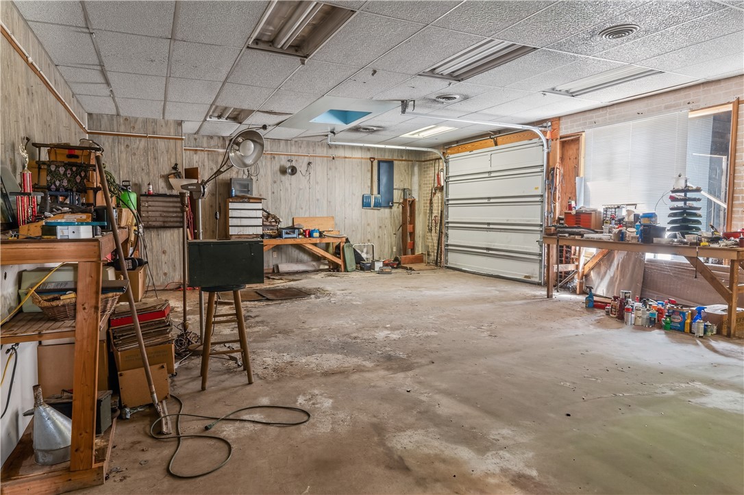 155 Farrs Bridge Road Pickens, SC 29671 - Photo 18 of 19 This spacious garage offers ample room for projects, storage or a business with road frontage.
