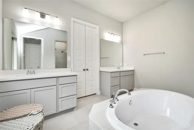 a bathroom with a sink and a bathtub