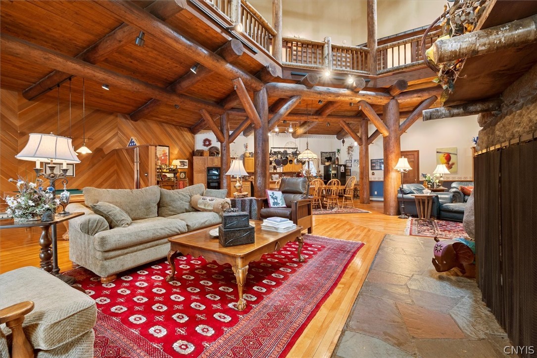 656 Hollywood Road, Unit 15 Webb, NY 13420 - Photo 11 of 50 Intimate living rooms around each hearth