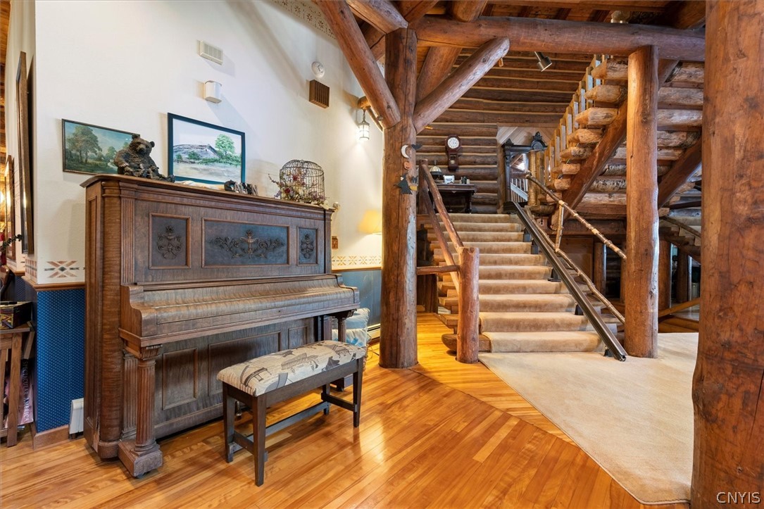 656 Hollywood Road, Unit 15 Webb, NY 13420 - Photo 15 of 50 Antique piano adds to the entertainment options