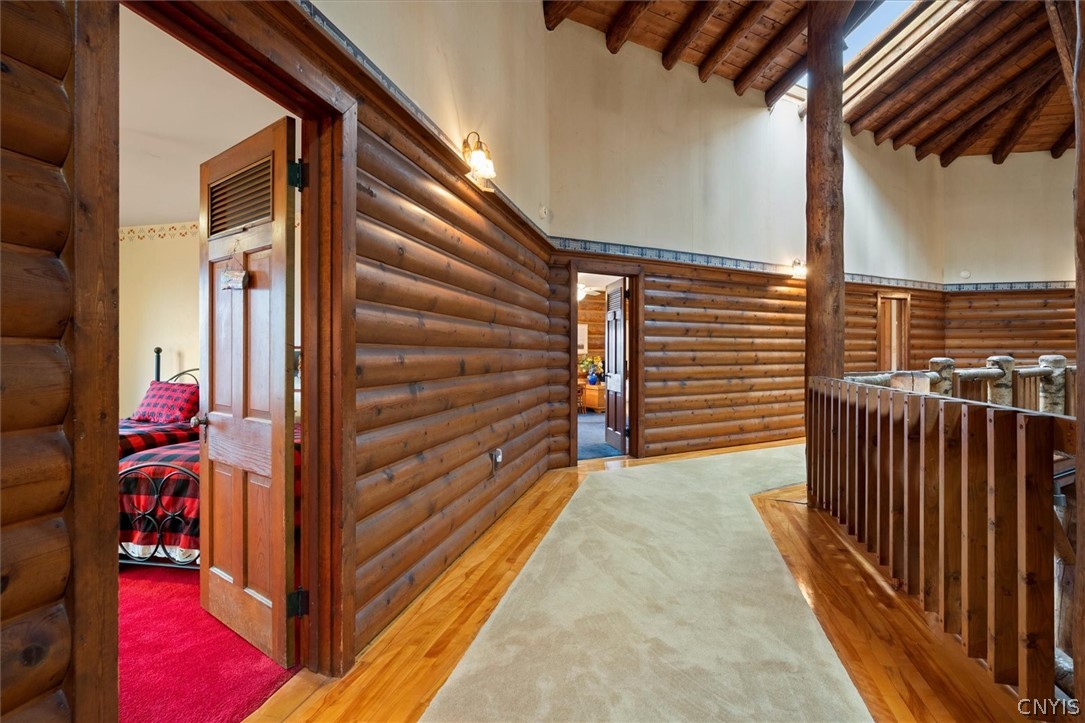 656 Hollywood Road, Unit 15 Webb, NY 13420 - Photo 16 of 50 Nice and wide 2nd floor hallway overlooks the firs