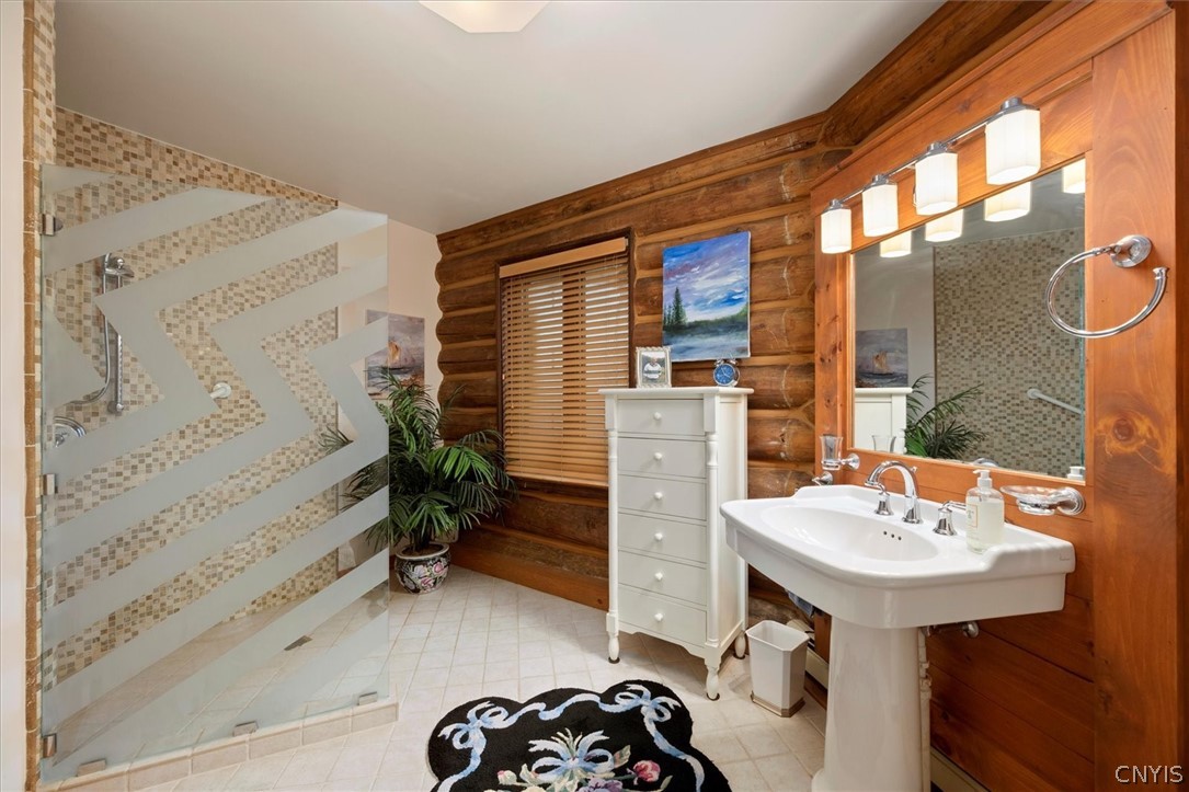 656 Hollywood Road, Unit 15 Webb, NY 13420 - Photo 19 of 50 Full bath with large walk in shower attached to Be