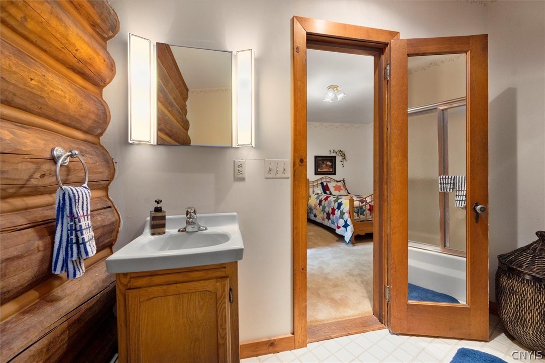 656 Hollywood Road, Unit 15 Webb, NY 13420 - Photo 25 of 50 Full bath with tub/shower attached to bedroom 5 1