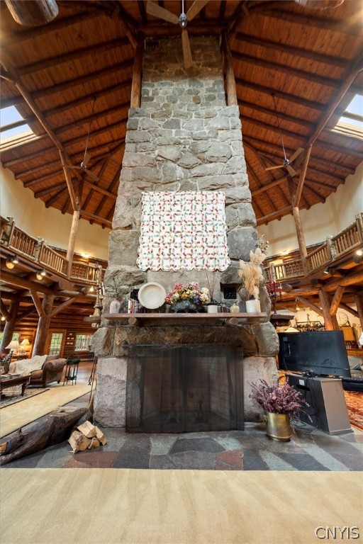 656 Hollywood Road, Unit 15 Webb, NY 13420 - Photo 33 of 50 Towering native granite fireplace centerpiece with