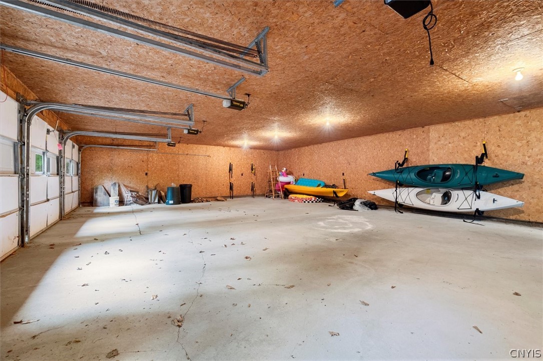 656 Hollywood Road, Unit 15 Webb, NY 13420 - Photo 37 of 50 Dry clean garage interior