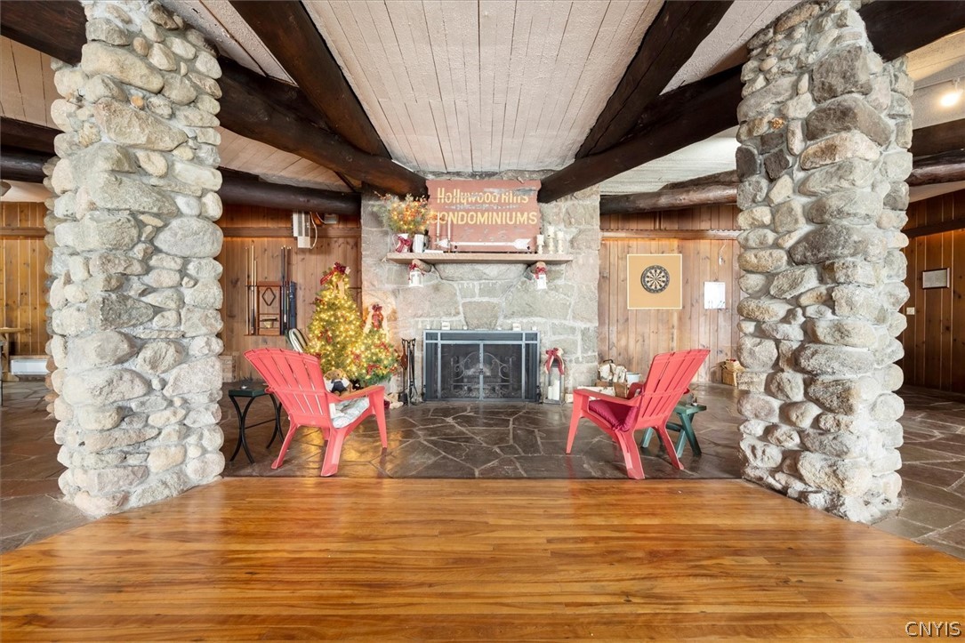 656 Hollywood Road, Unit 15 Webb, NY 13420 - Photo 40 of 50 Common Room Fireplace ideal for pictures at gather