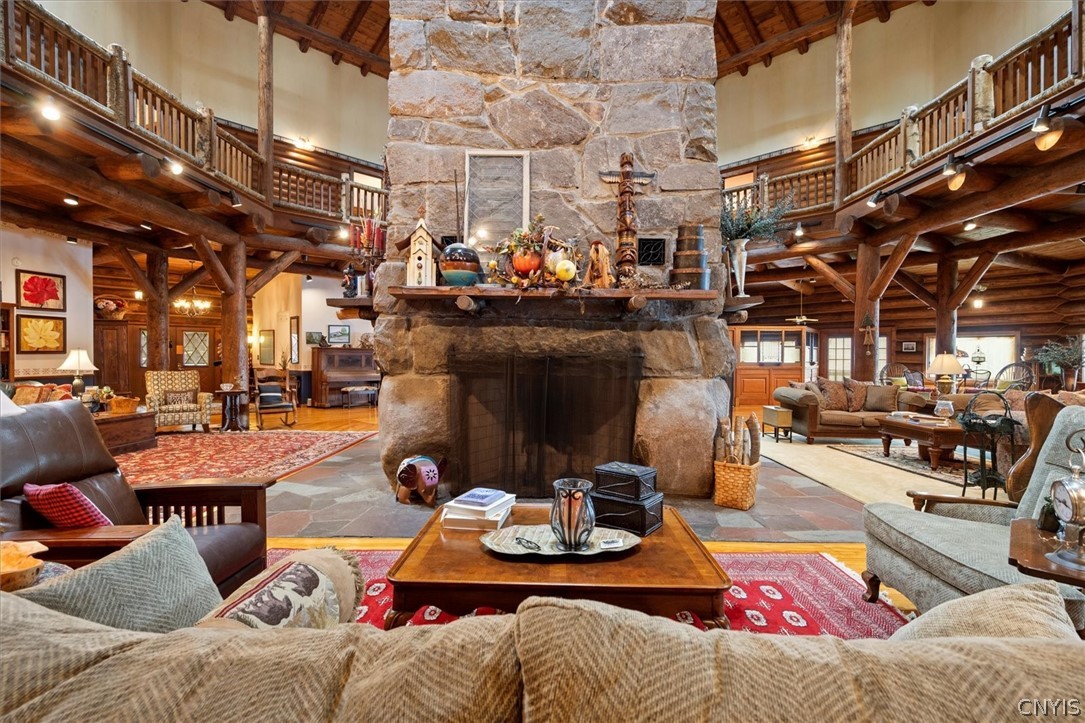 656 Hollywood Road, Unit 15 Webb, NY 13420 - Photo 9 of 50 Four comfortable sitting areas at each hearth