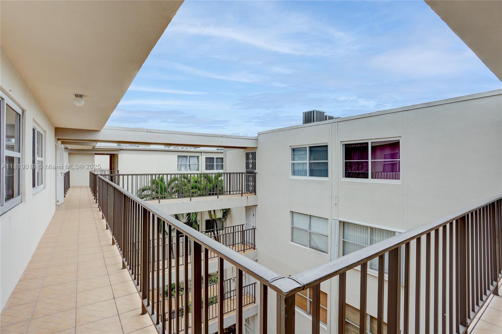 5501 Northwest 7th Street, Unit E408 Miami, FL 33126 - Photo 11 of 35 a view of balcony