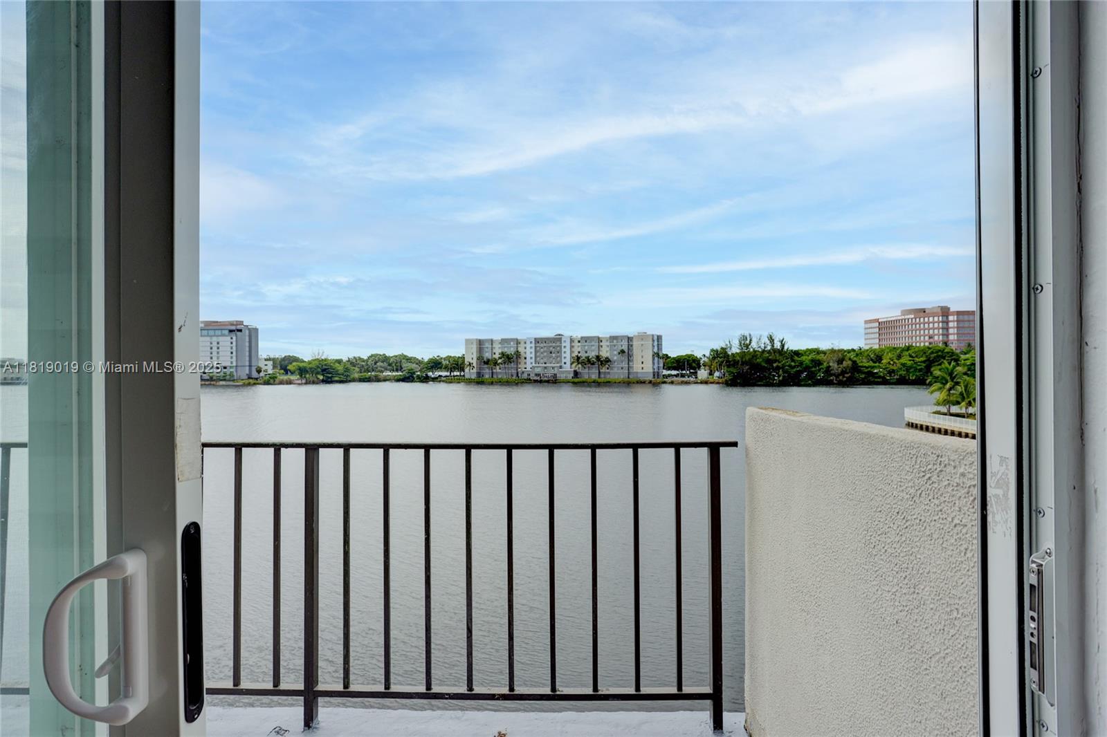 5501 Northwest 7th Street, Unit E408 Miami, FL 33126 - Photo 3 of 35 a view of a balcony